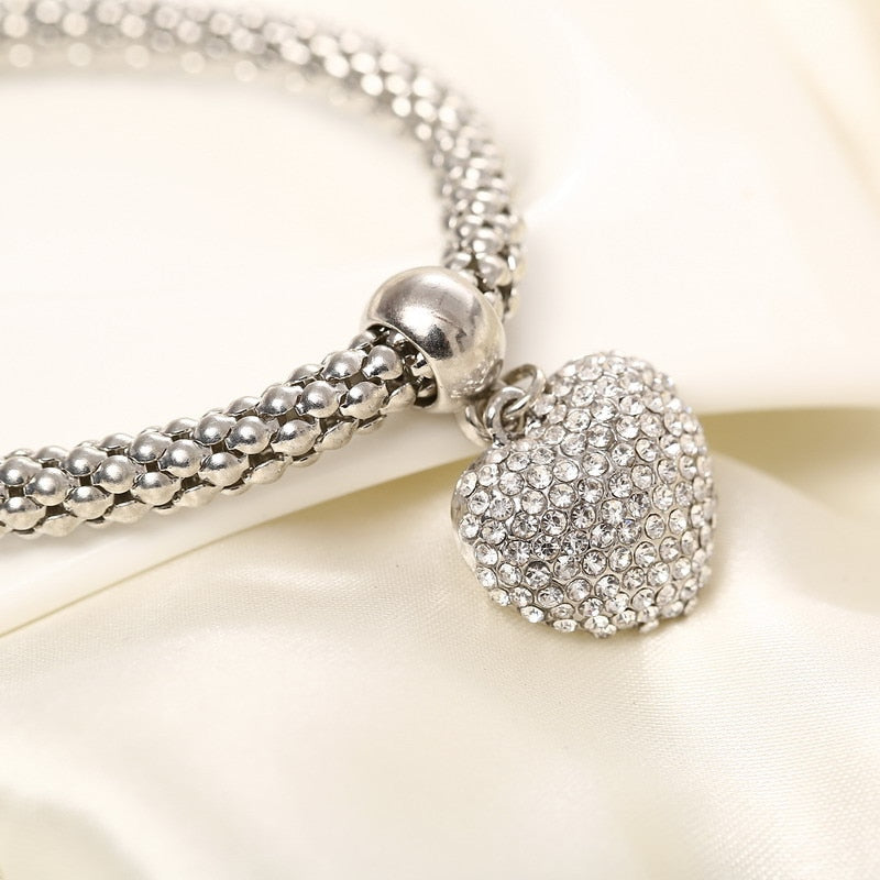 Aria – Bracelete em metal com corações sólidos