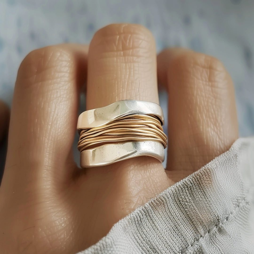 Thalia – Bague em prata com fios de ouro entrelaçados