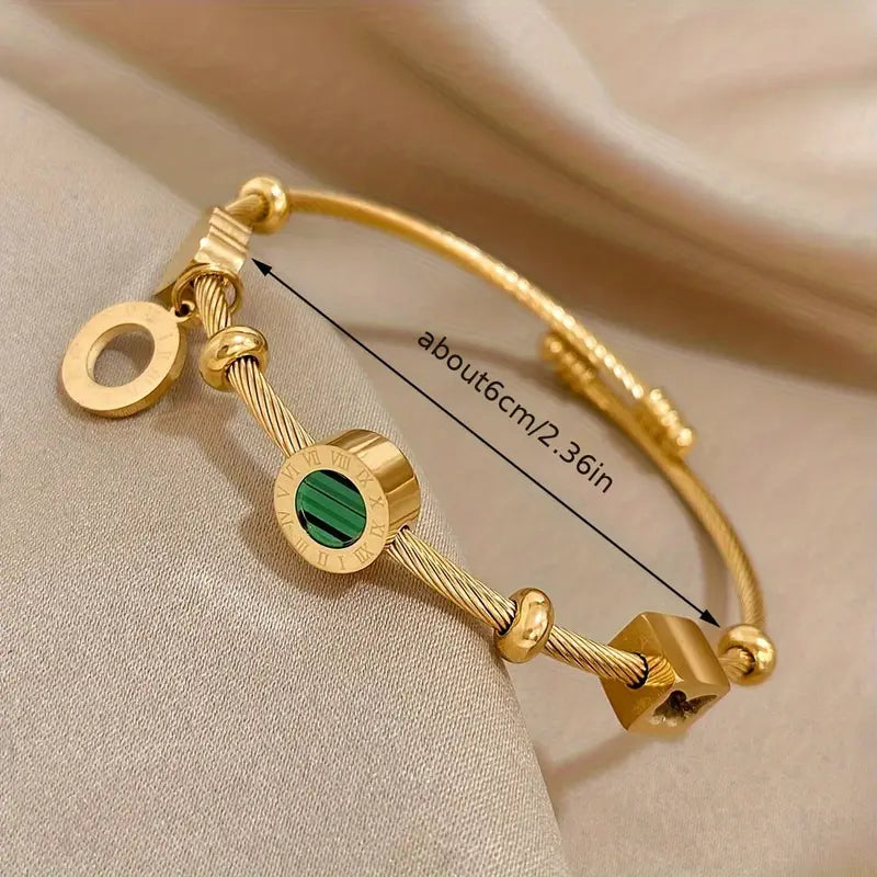 Rhian – Bracelete dourado de assinatura