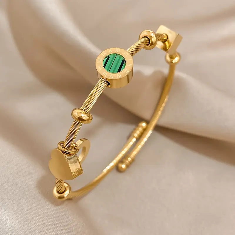 Rhian – Bracelete dourado de assinatura