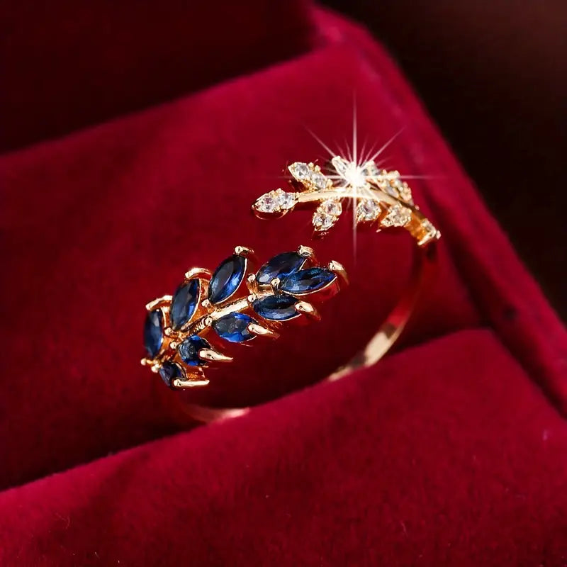 Vivara – Anel dourado com safira