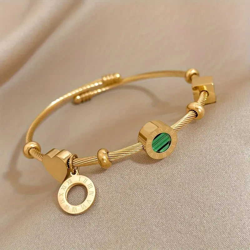 Rhian – Bracelete dourado de assinatura