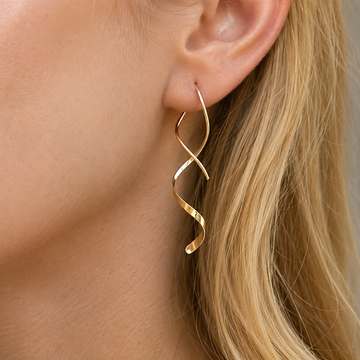 Mel – Brincos espirais em ouro