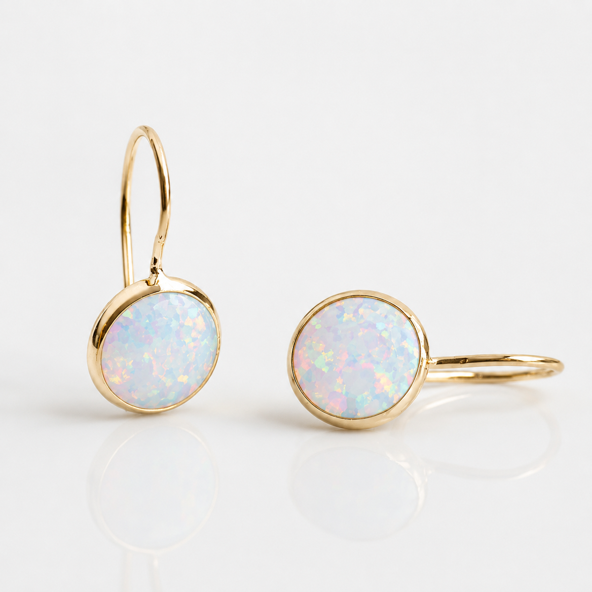 Mireya – Brincos vintage em ouro com pedra de opala