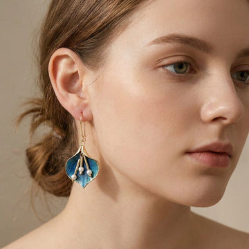 Yara – Brincos Lotus Azul em prata vintage