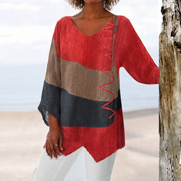 Eli - Blusa colorida que cobre a barriga