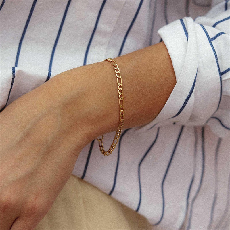 Saturno - Bracelete em corrente dourada