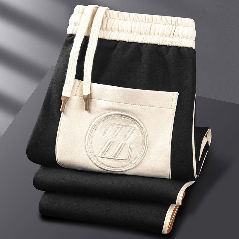 Lexter - Ein Sportanzug bestehend aus einer Jacke mit Reißverschluss