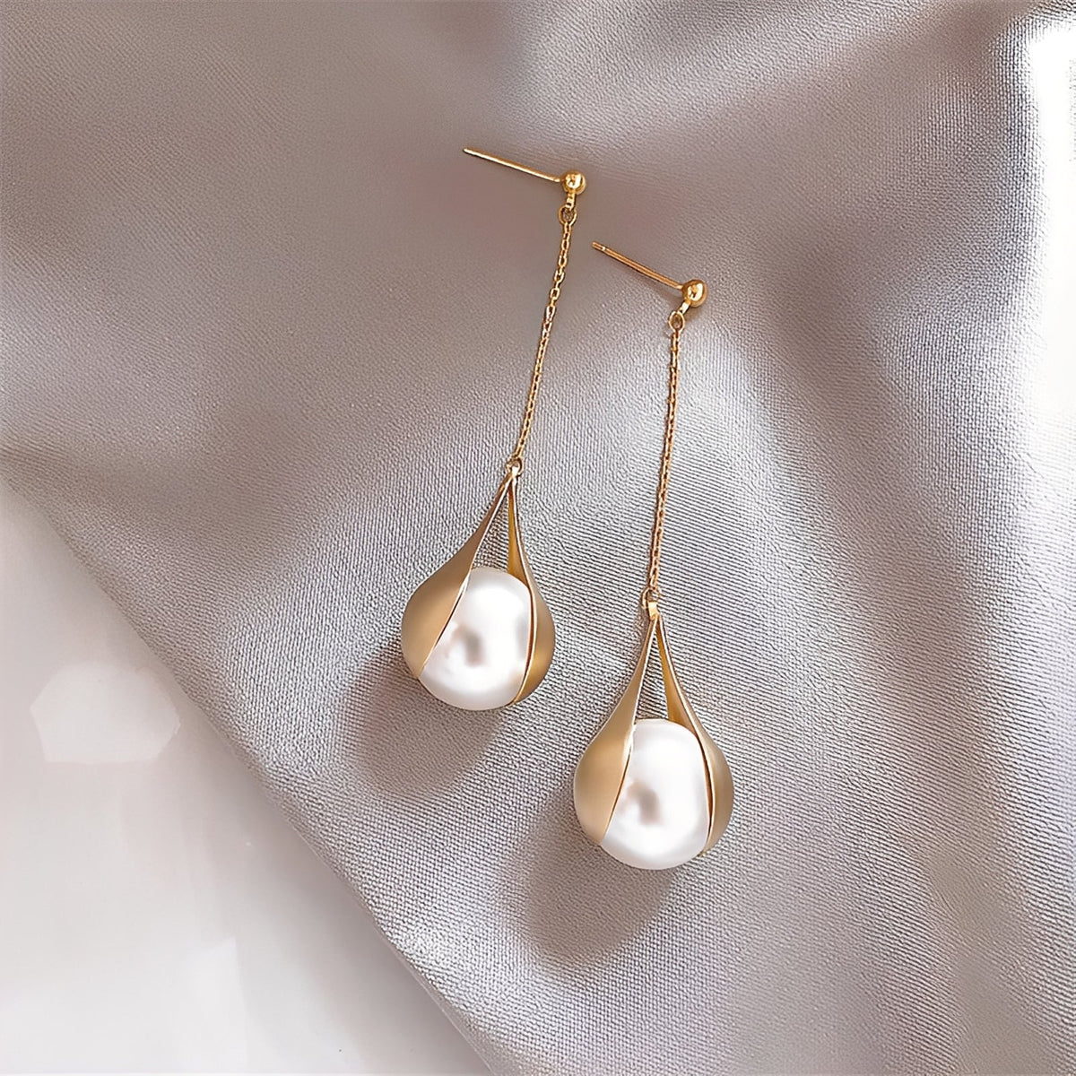Asa – Brincos de ouro e pérolas