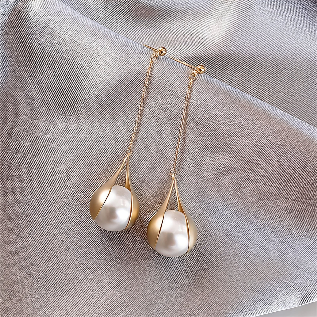 Asa – Brincos de ouro e pérolas