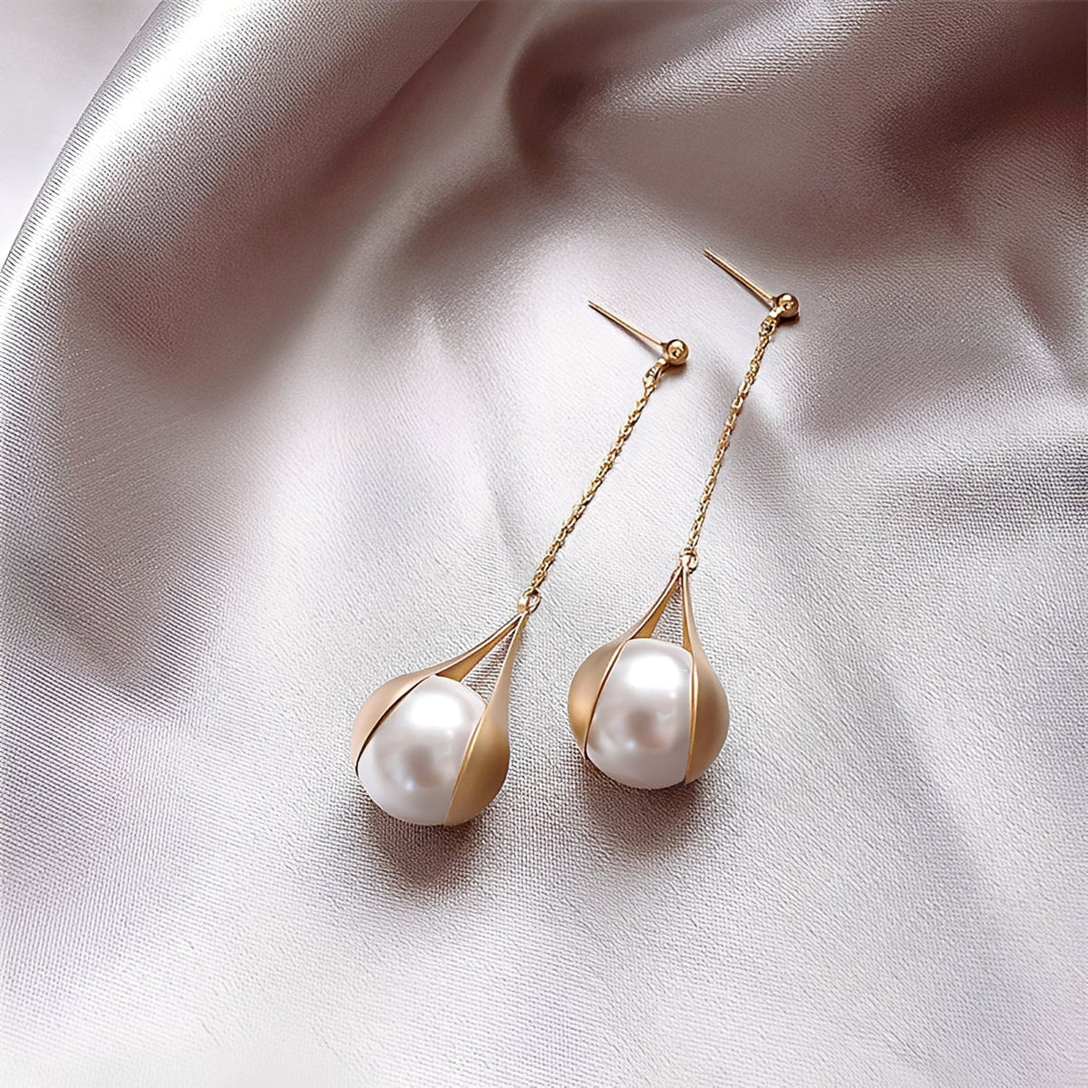 Asa – Brincos de ouro e pérolas