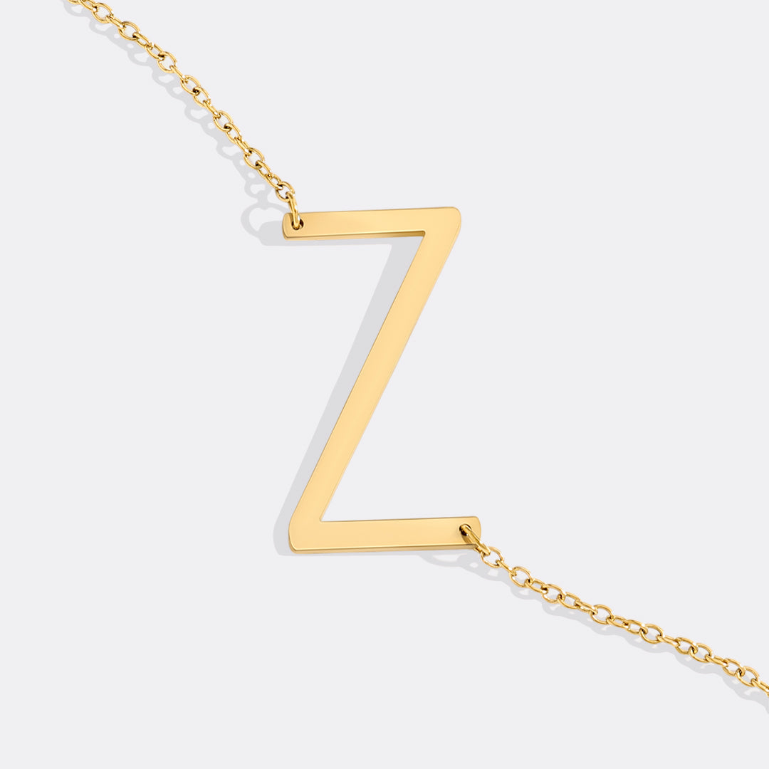 Inez – Colar com inicial declarativa
