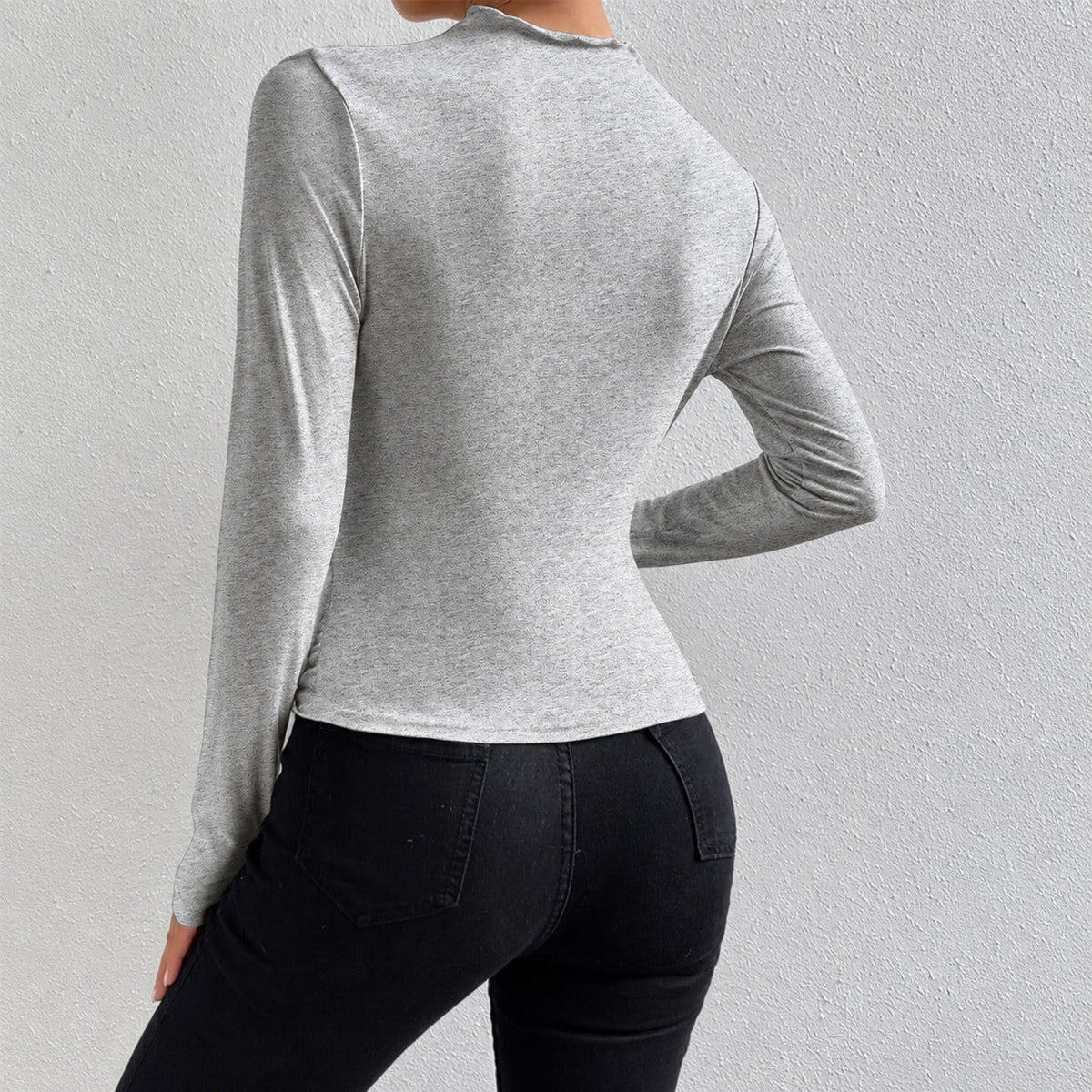 Livia - Camiseta de manga longa ajustada com babados