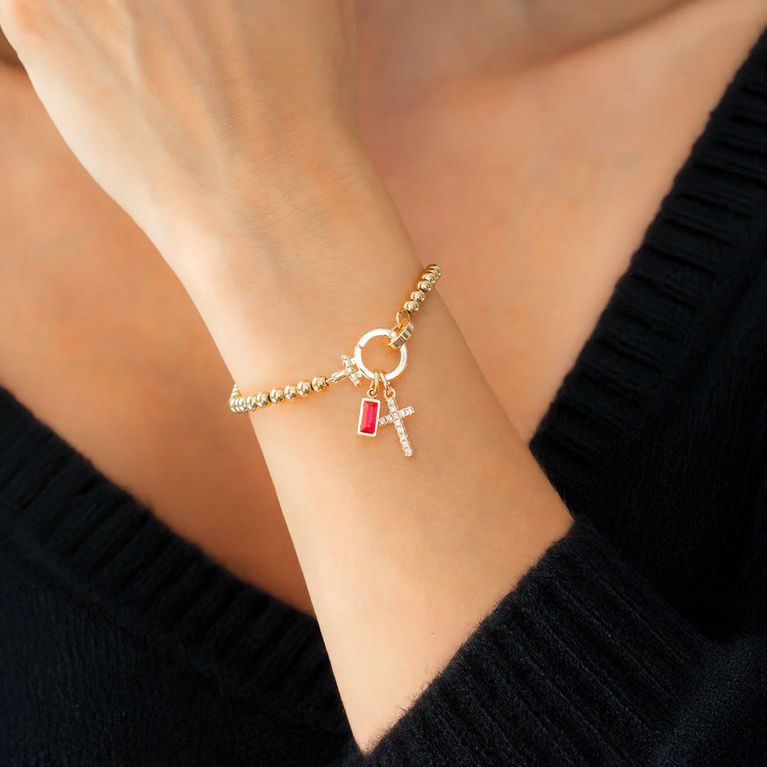 Eli – Pulseira com pedra do mês de nascimento e pendente de cruz