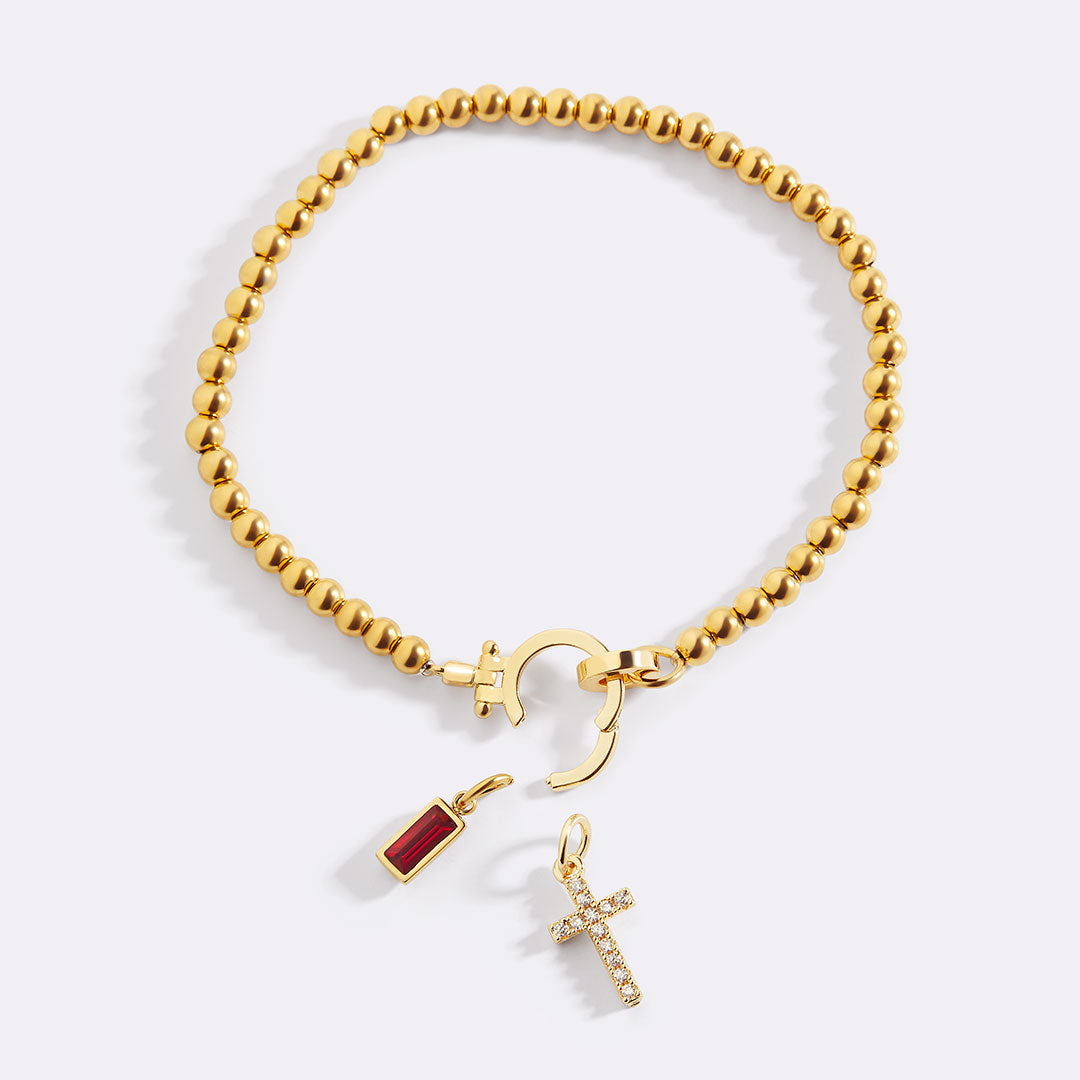 Eli – Pulseira com pedra do mês de nascimento e pendente de cruz