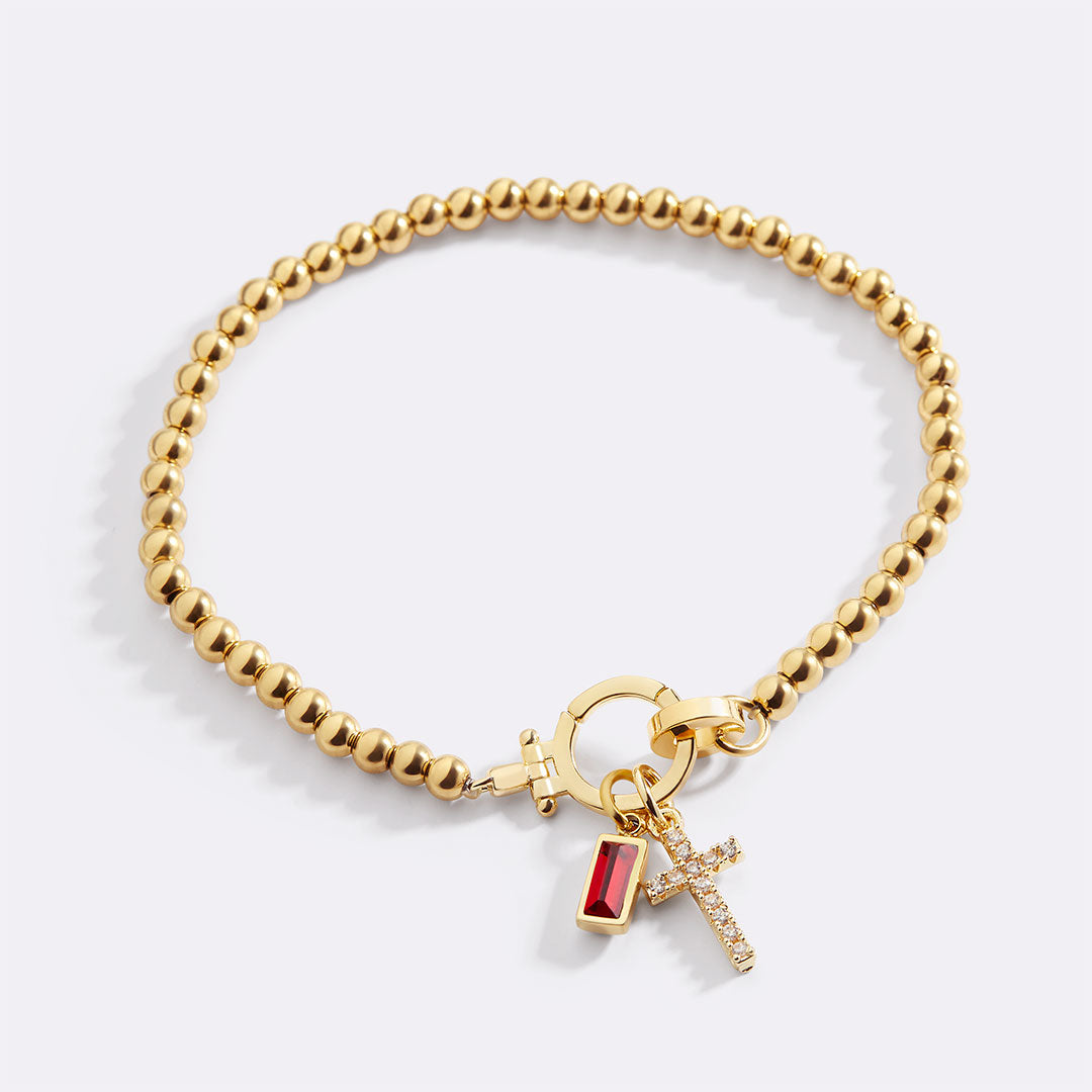 Eli – Pulseira com pedra do mês de nascimento e pendente de cruz