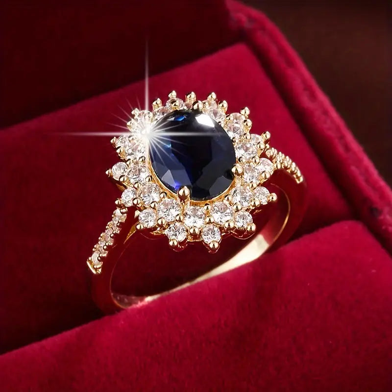 Delphine – Bague Chic dourada com pedra azul