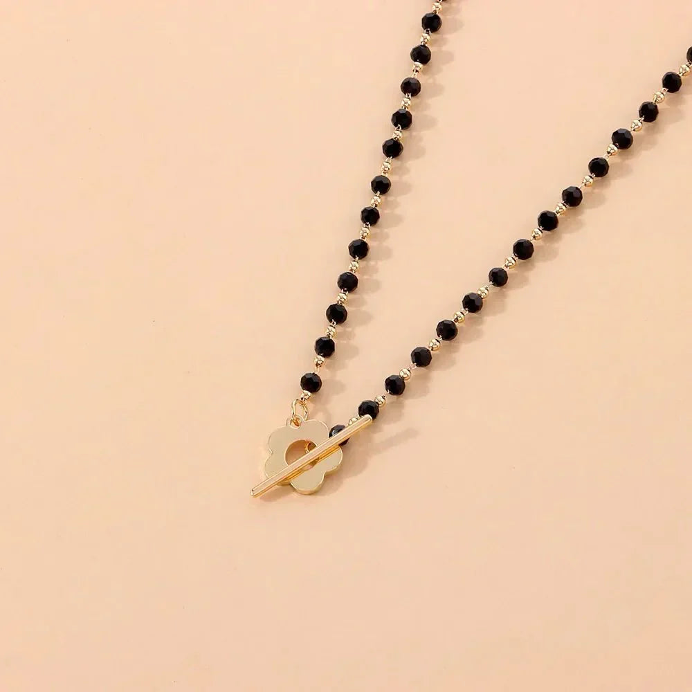 Naya - Colar choker floral com fecho em flores