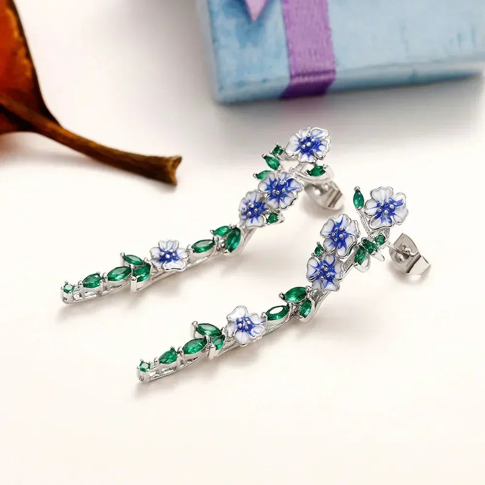 Yara – Brincos pendentes de flores azuis