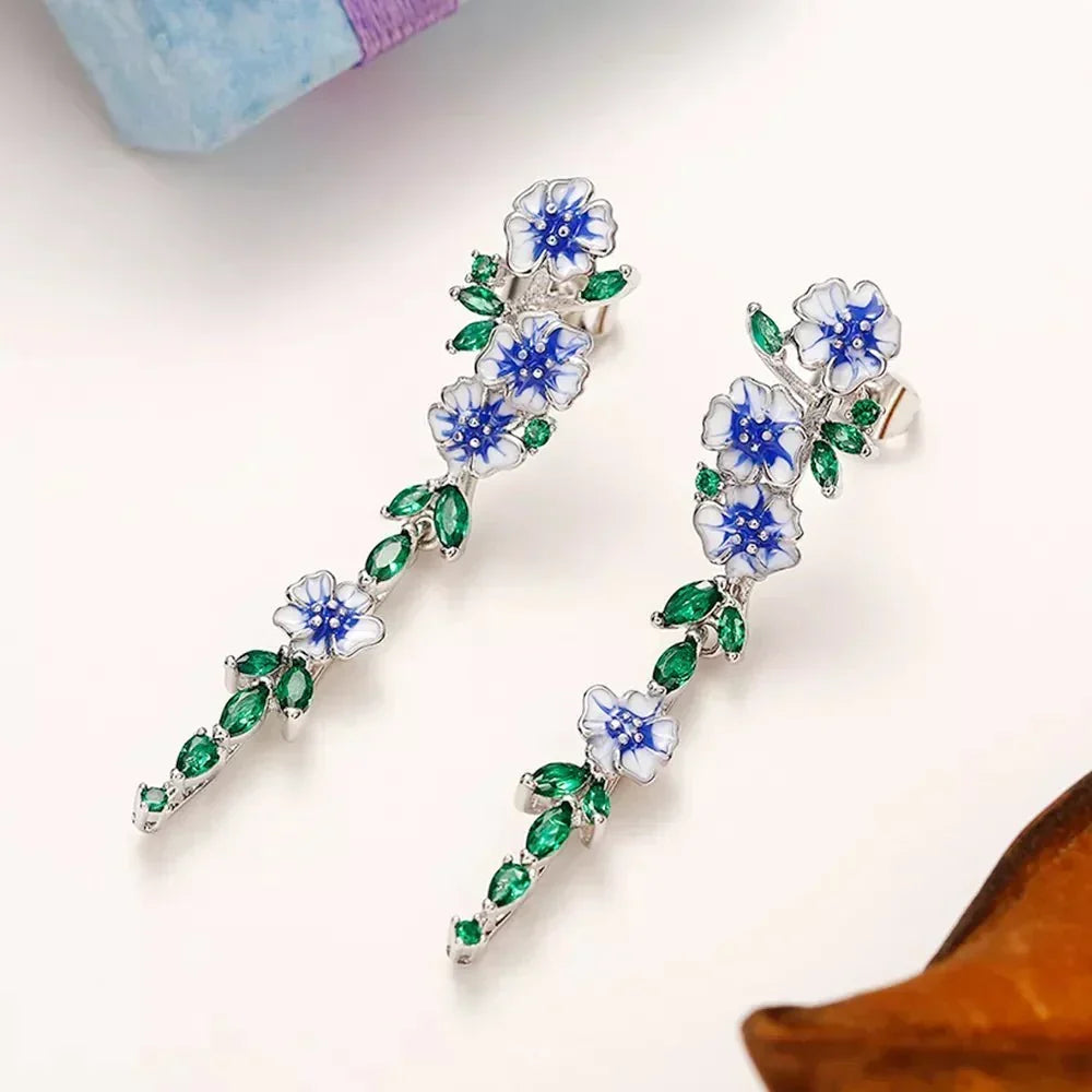 Yara – Brincos pendentes de flores azuis