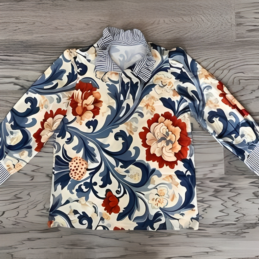 Blusa feminina com abertura de meio botão, gola estilo camisa e mangas longas com punhos listrados contrastantes, estampa all-over