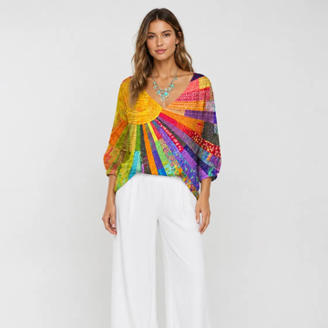 Blusa feminina com estampa patchwork - gola careca, manga longa, caimento relaxado