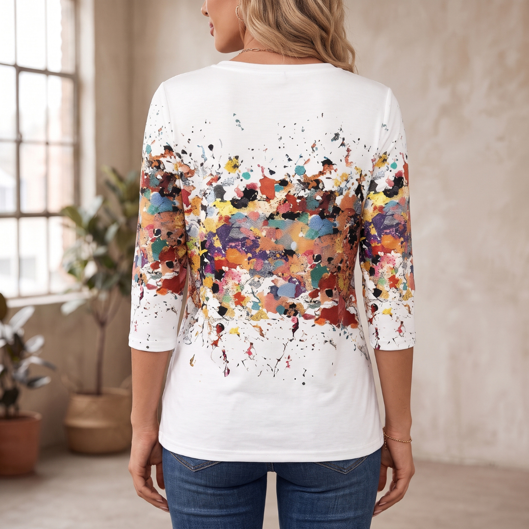 Blusa feminina de mangas longas com decote redondo – estampa abstrata de respingos