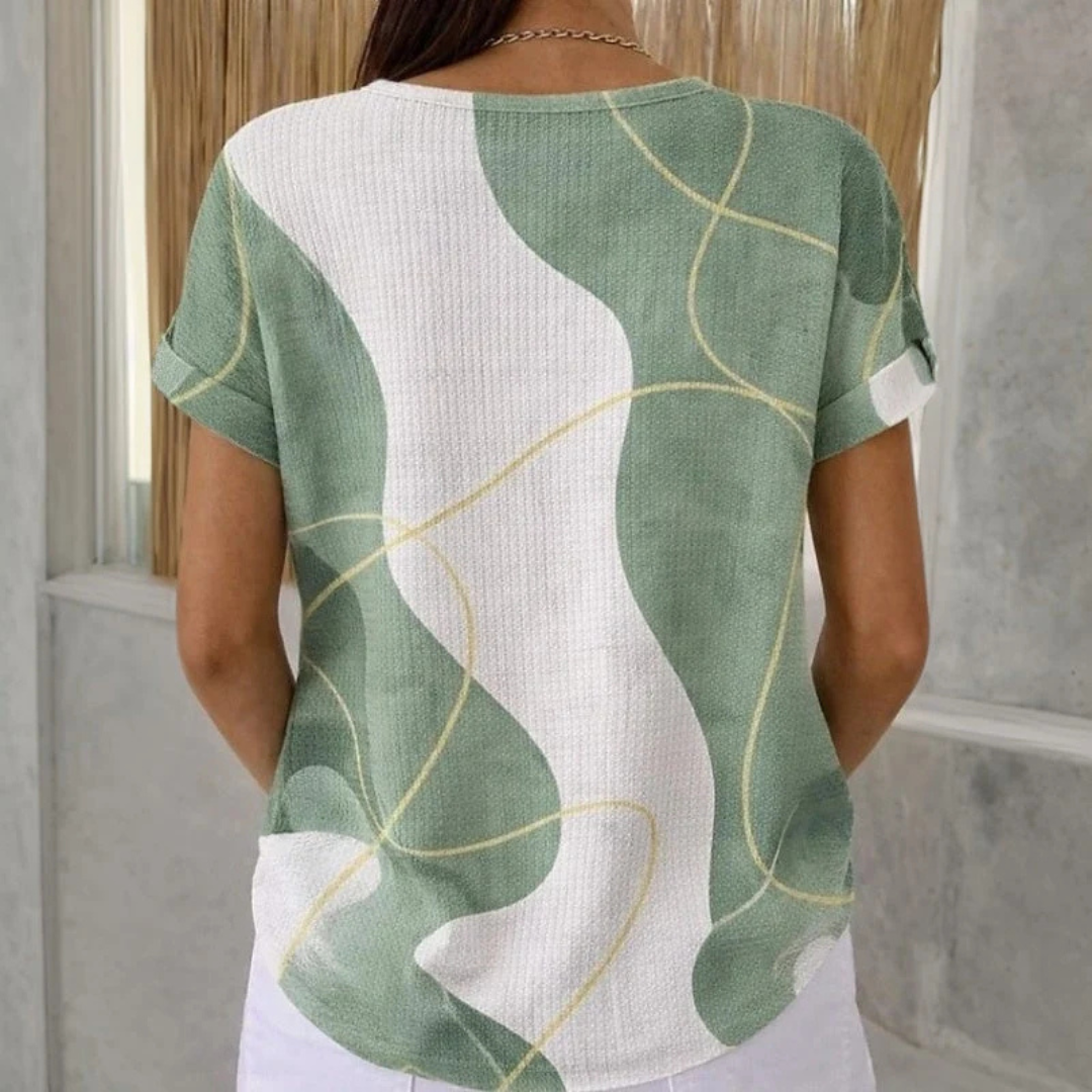 Blusa feminina - Henley de manga curta com abertura de 3 botões, gola redonda, caimento reto, estampa colorblock abstrata
