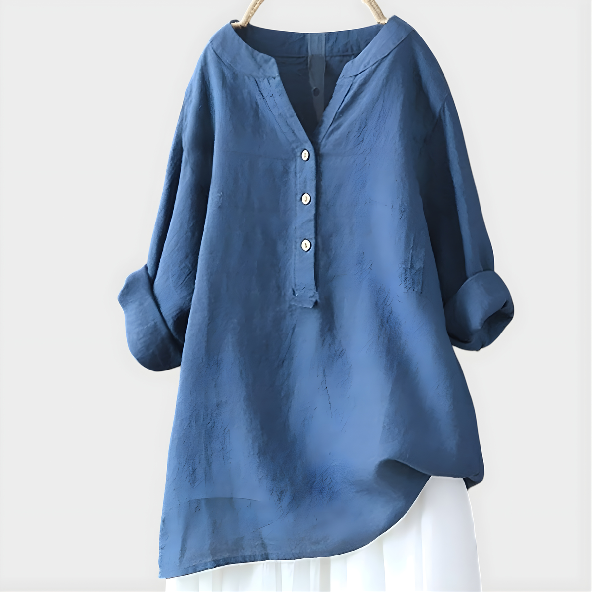 Blusa femininha V com estampa de plissê e recorte assimétrico