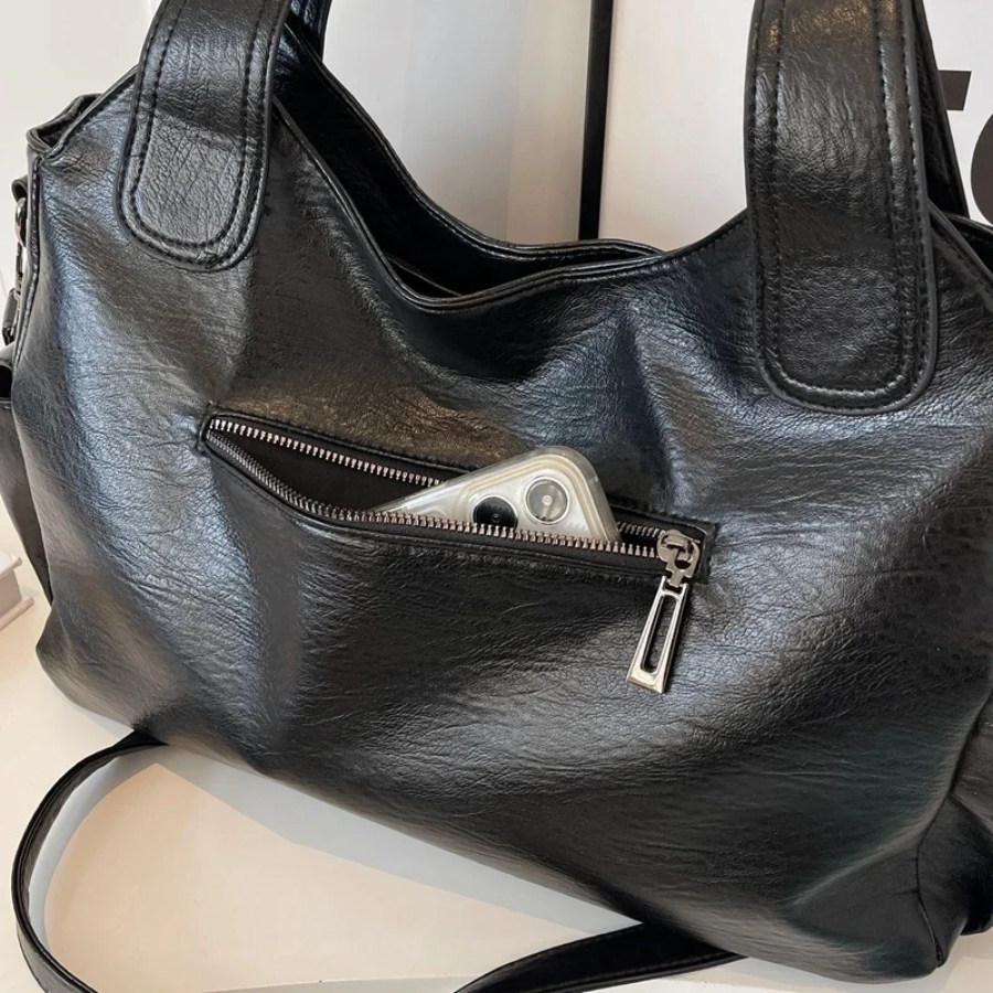 Bolsa de ombro feminina com múltiplos compartimentos e design elegante