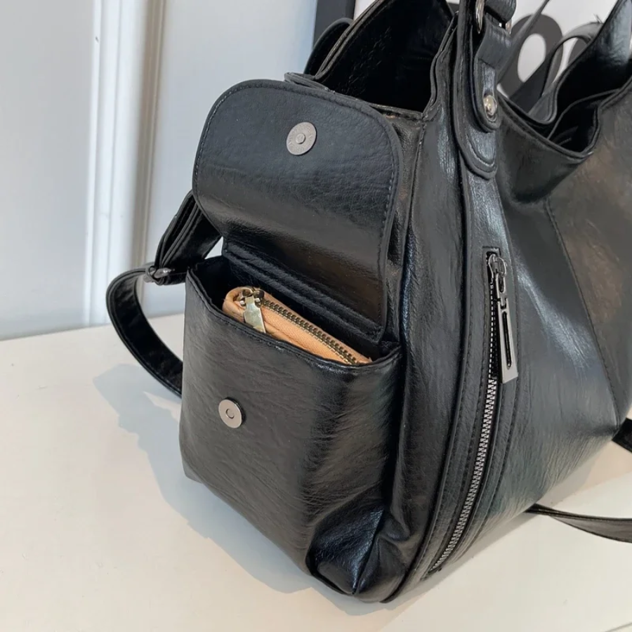 Bolsa de ombro feminina com múltiplos compartimentos e design elegante