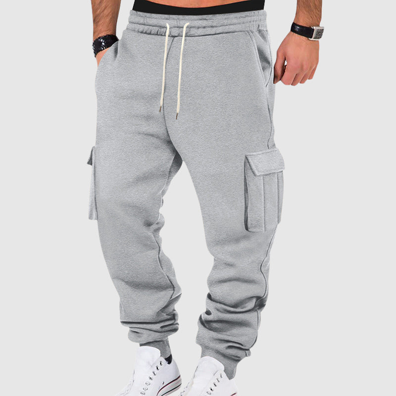 Calças cargo masculinas com bolsos laterais e cós com cordão - ajuste relaxado
