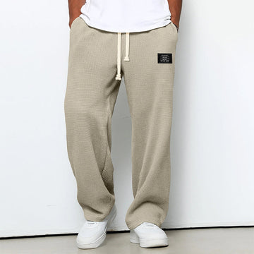 Calças jogger masculinas com textura em waffle e cós com cordão - corte reto