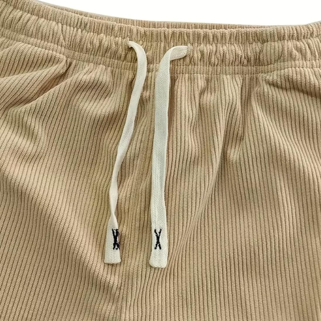 Calças masculinas com cintura com cordão ajustável, corte reto relaxado e bolsos laterais