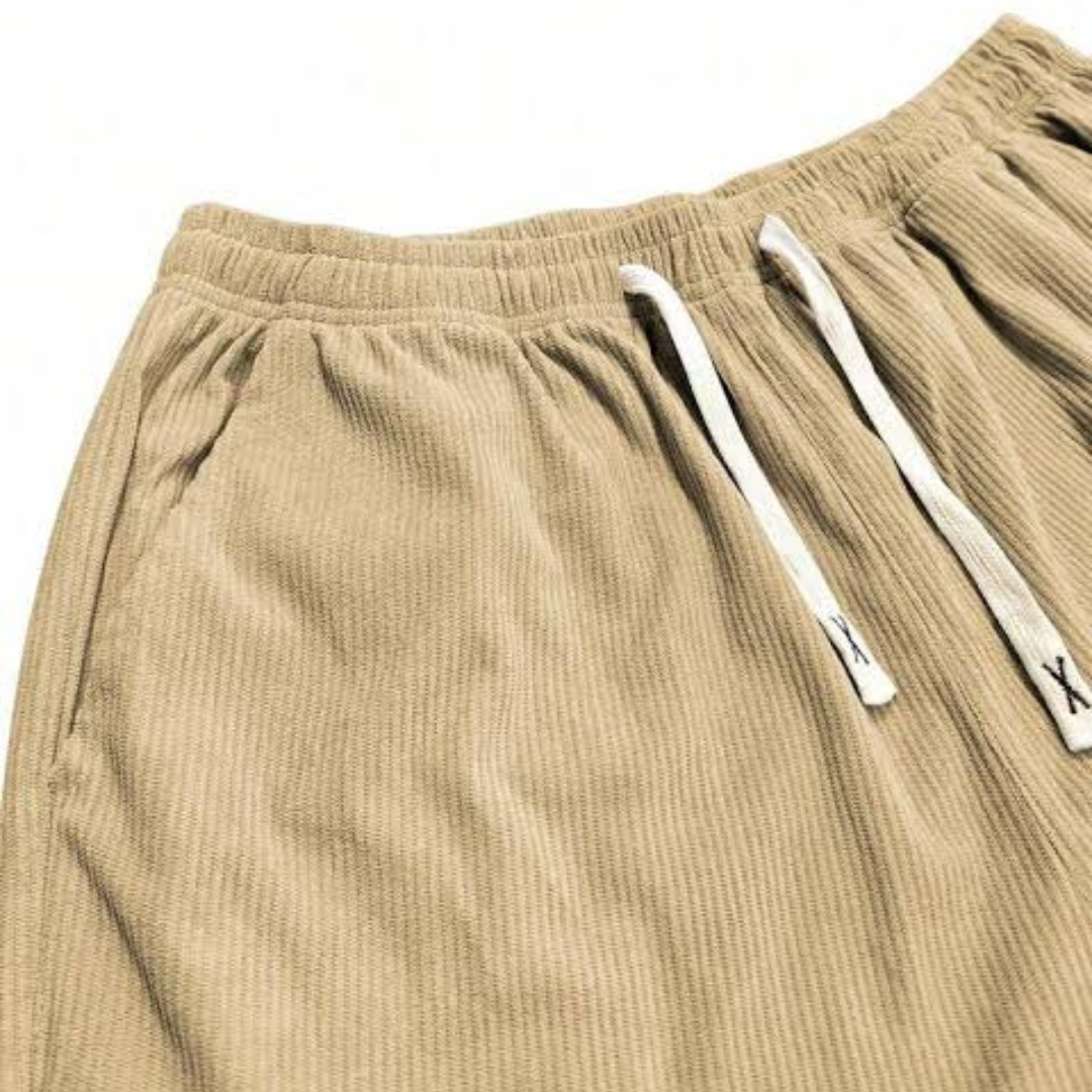 Calças masculinas com cintura com cordão ajustável, corte reto relaxado e bolsos laterais