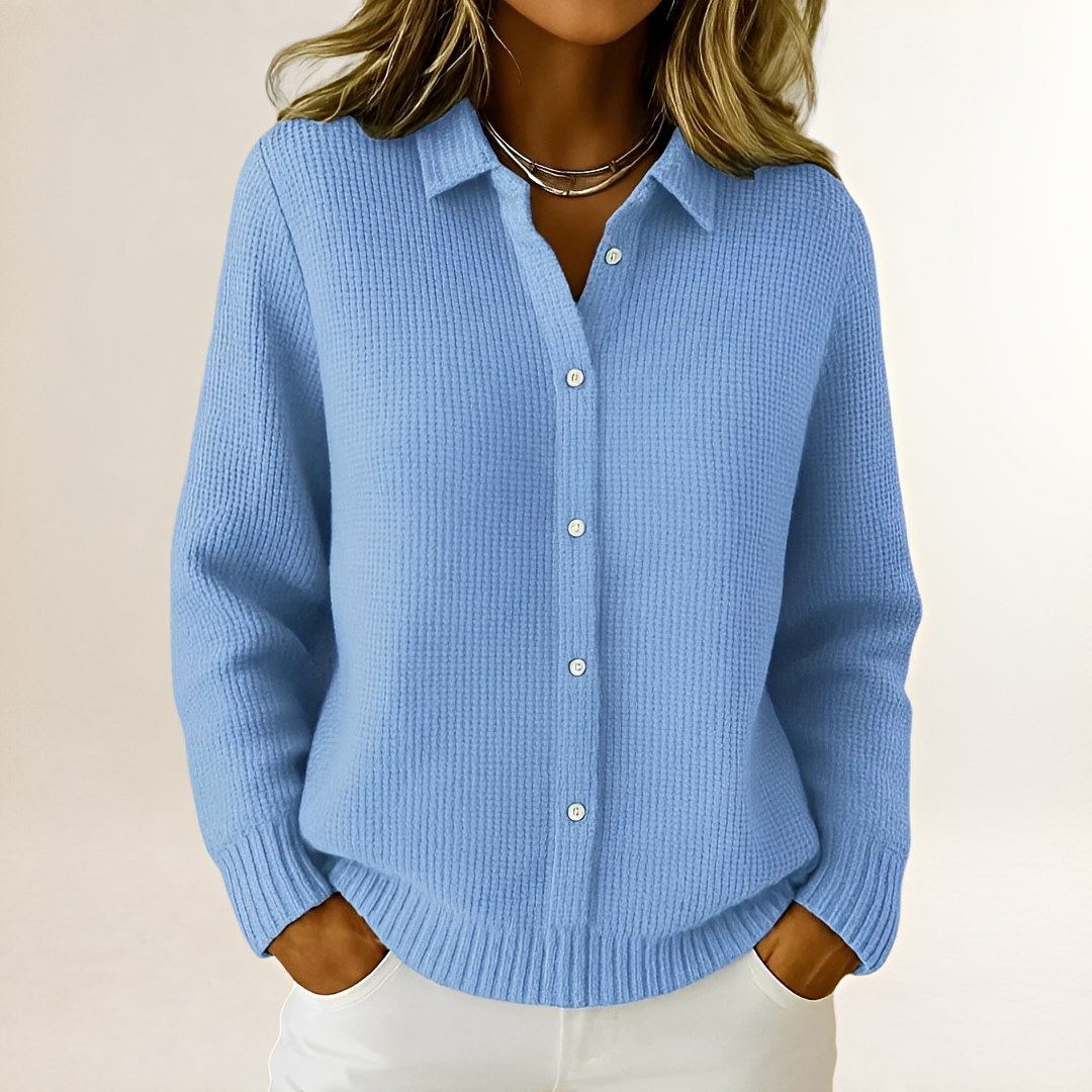 Cardigã feminino alongado com fechamento frontal por botões e gola tipo camisa - ajuste relaxado