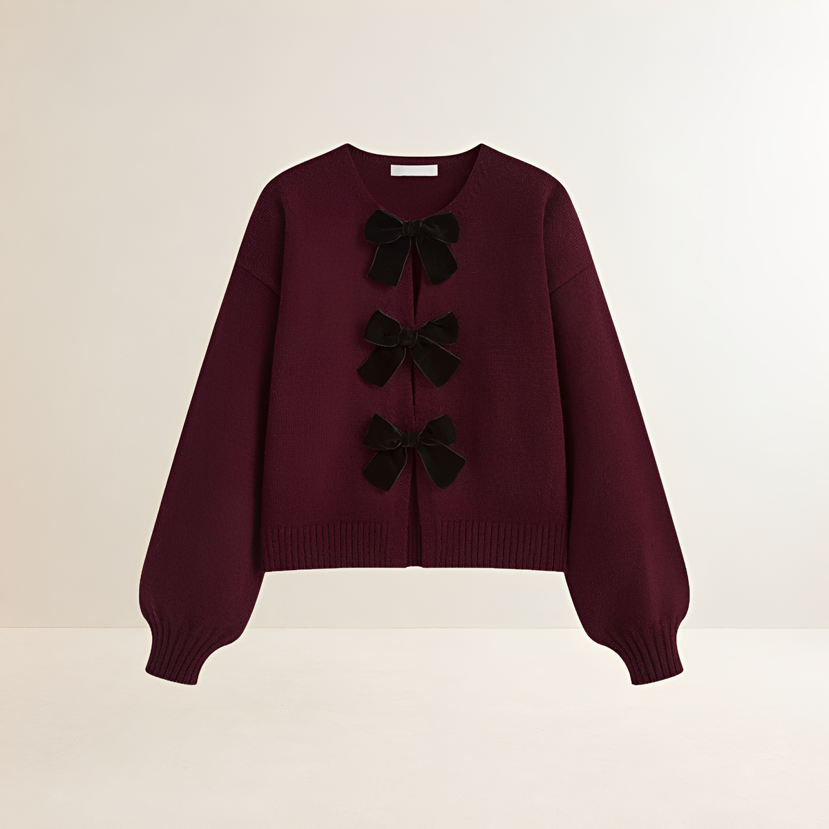 Cardigan feminino com mangas lanternas detalhes laço decote V cropped