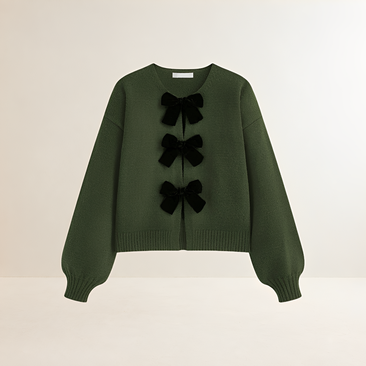 Cardigan feminino com mangas lanternas detalhes laço decote V cropped