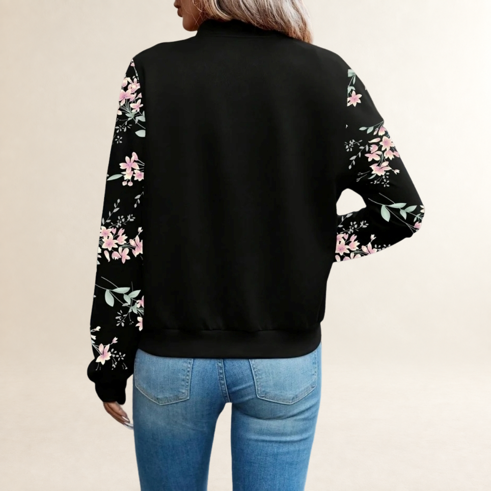 Casaco feminino com zíper, gola baseball, mangas longas com punhos canelados e estampa floral e animal print