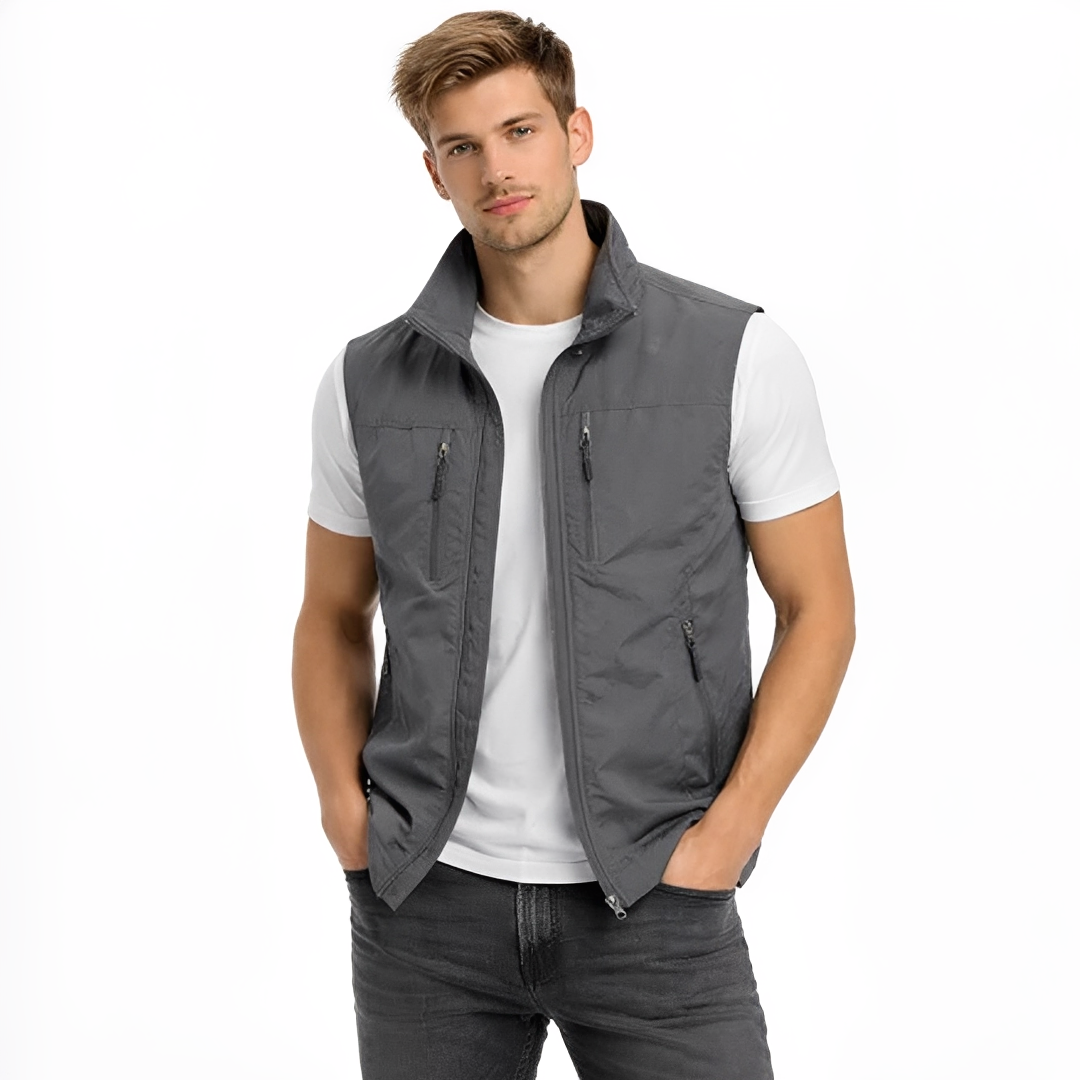 Colete masculino com zíper frontal, gola alta e 4 bolsos com zíper