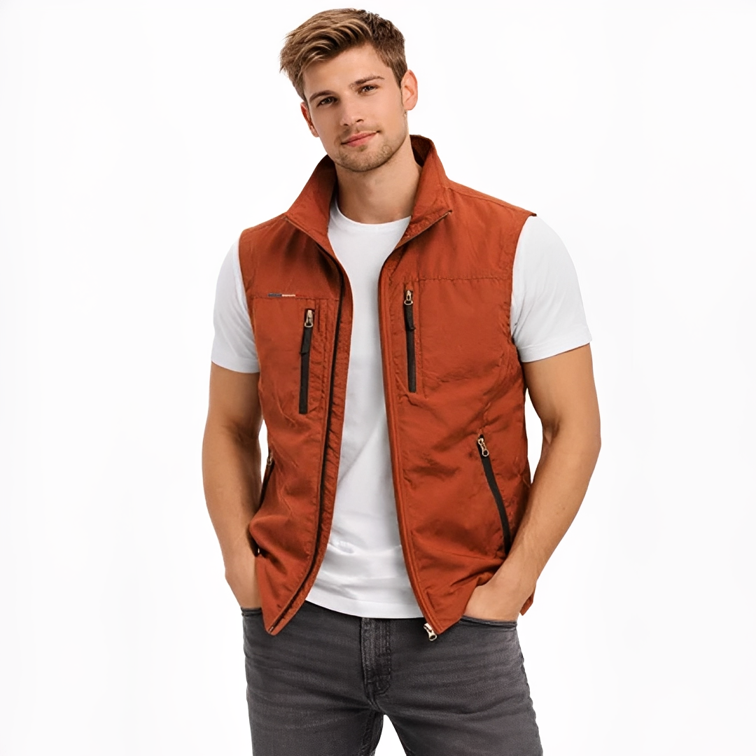 Colete masculino com zíper frontal, gola alta e 4 bolsos com zíper