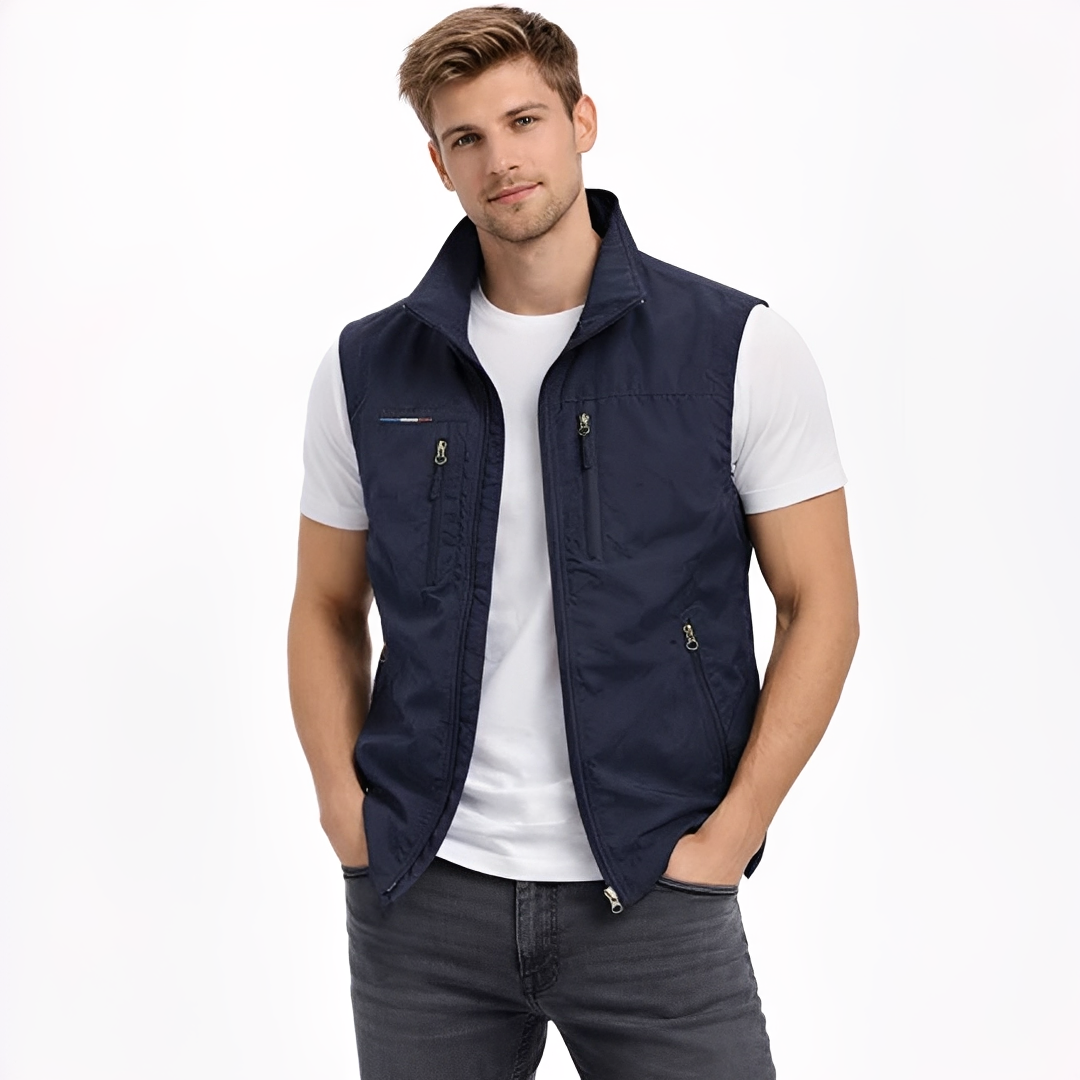 Colete masculino com zíper frontal, gola alta e 4 bolsos com zíper