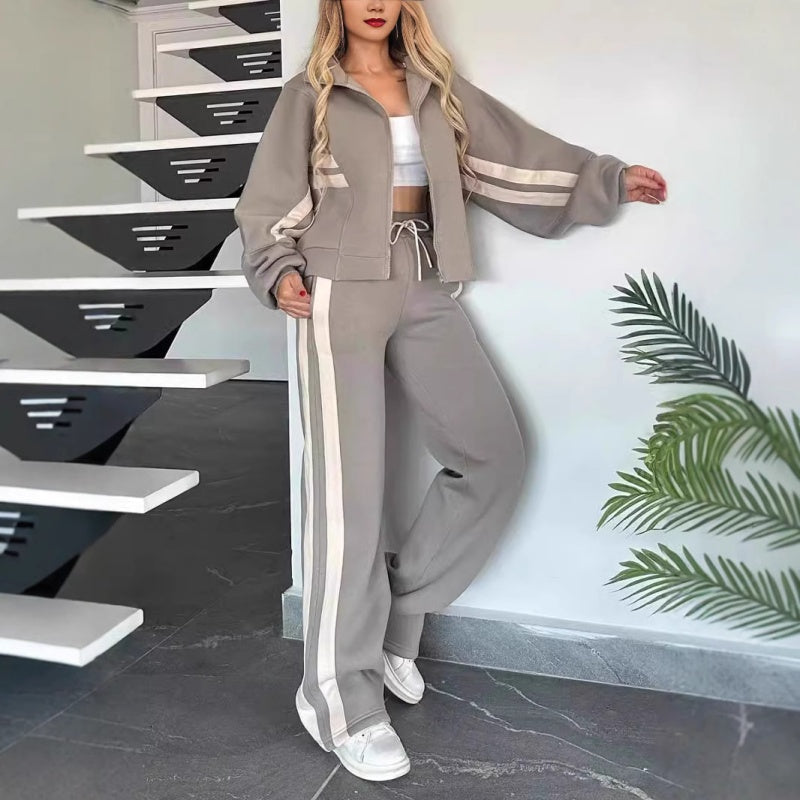 Conjunto esportivo feminino two-piece com jaqueta zip-up e calça wide-leg com listras laterais