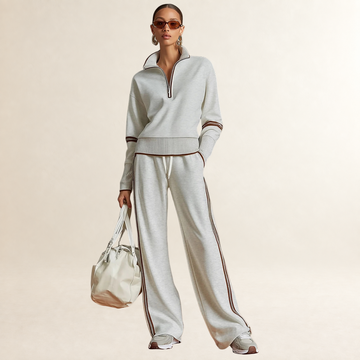 Conjunto feminino de moletom com meia-zíper e calça pantalona listrada esportiva