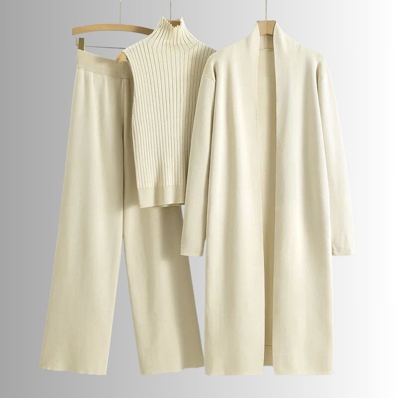 Conjunto feminino de três peças com blusa de gola alta, calças de perna larga e sobreposição