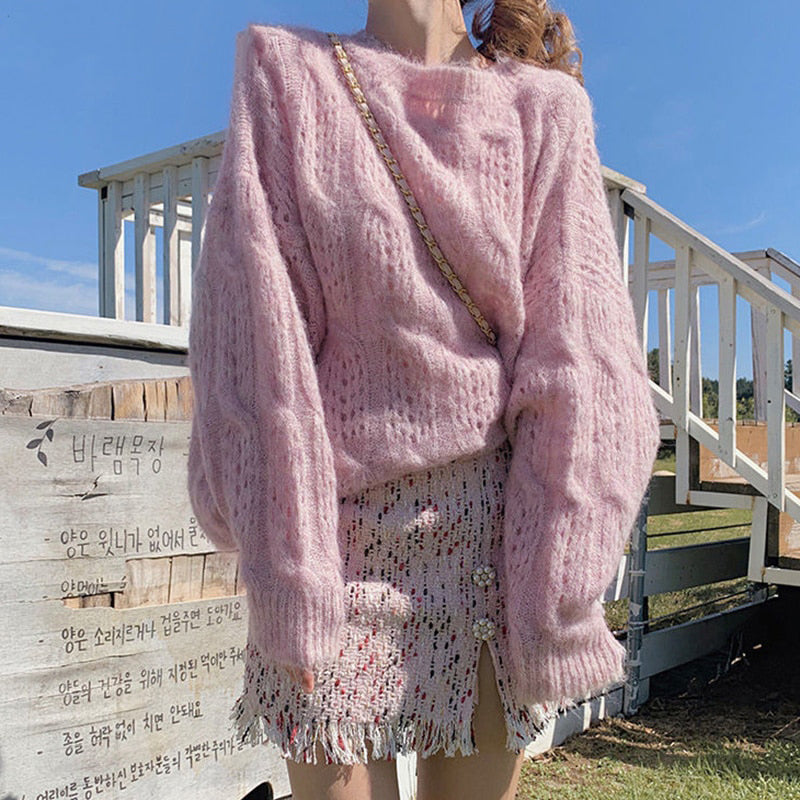 Suéter feminino oversized com mangas longas e detalhe de ponto aberto