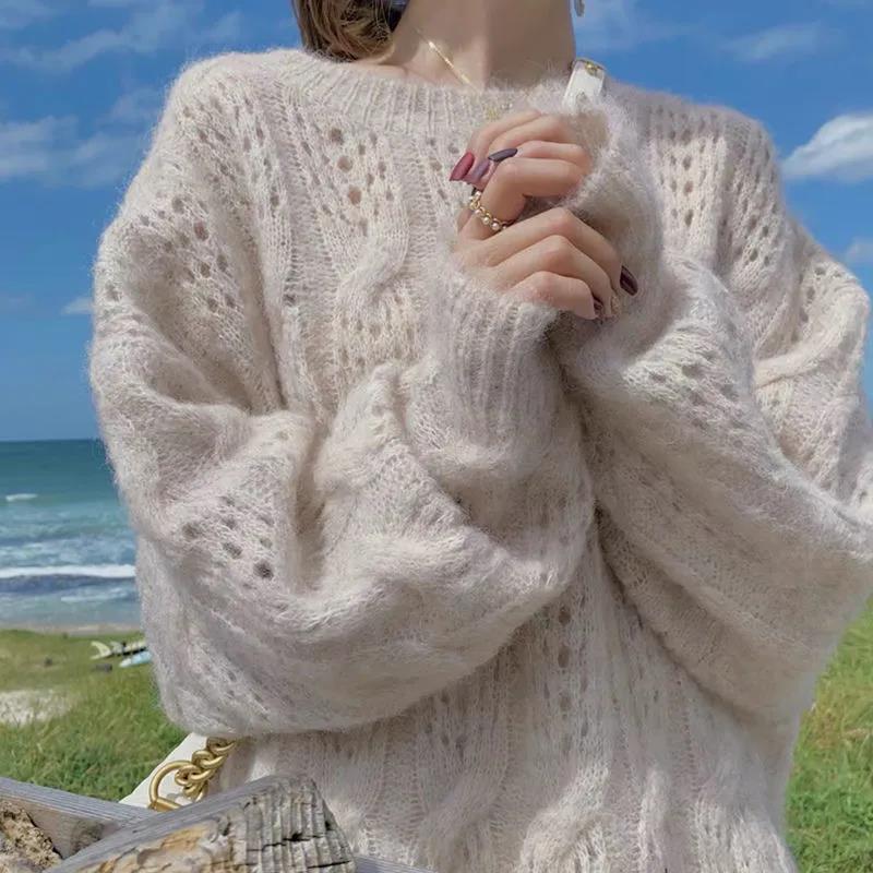 Suéter feminino oversized com mangas longas e detalhe de ponto aberto