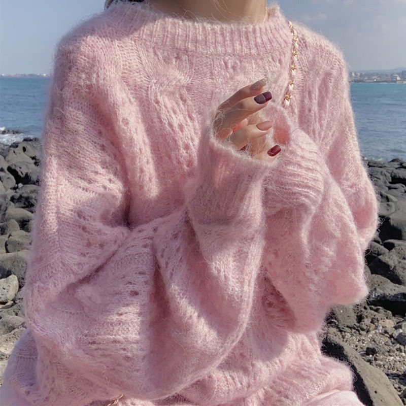 Suéter feminino oversized com mangas longas e detalhe de ponto aberto