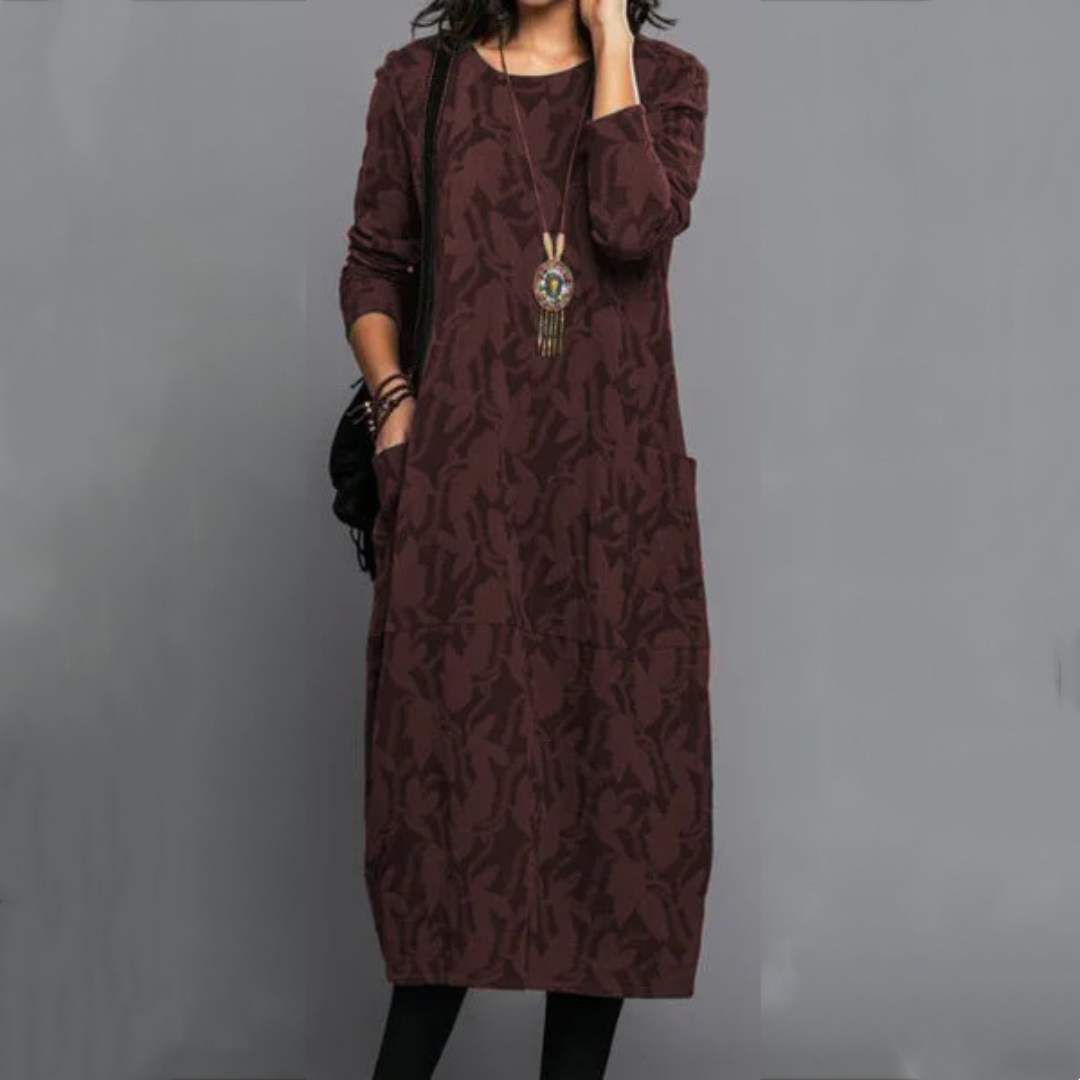 Vestido curto midi feminino com decote redondo, mangas longas, bolso lateral e estampa sutil de folhas