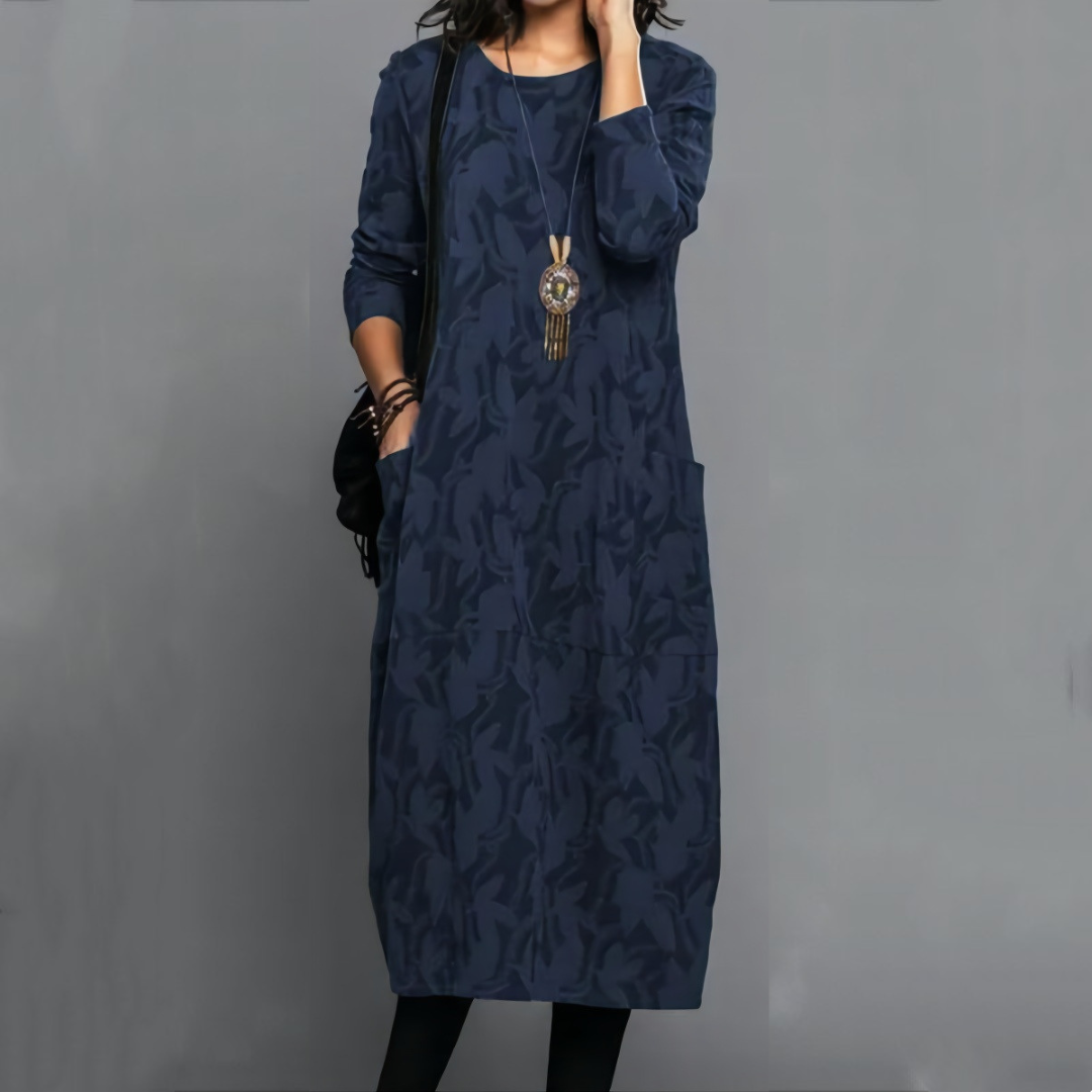 Vestido curto midi feminino com decote redondo, mangas longas, bolso lateral e estampa sutil de folhas